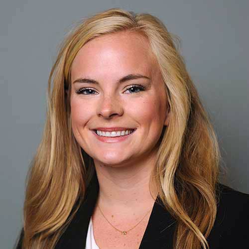 a woman smiling for the camera