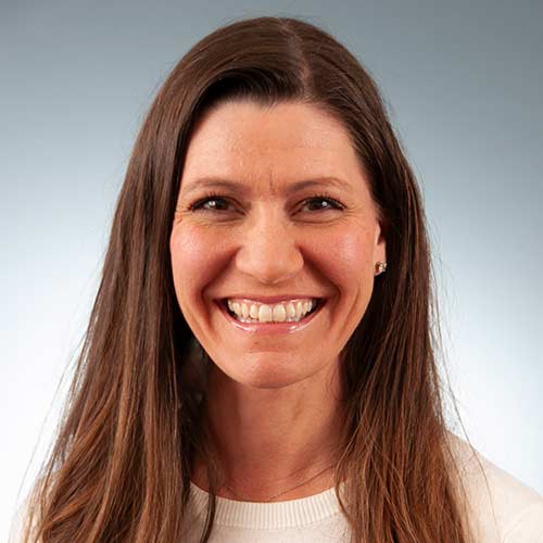 a woman smiling for the camera