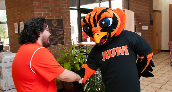 a group of people standing in front of a building