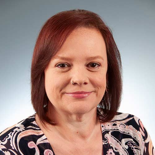 a person smiling for the camera