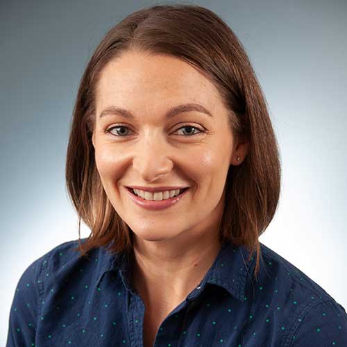 a woman smiling for the camera