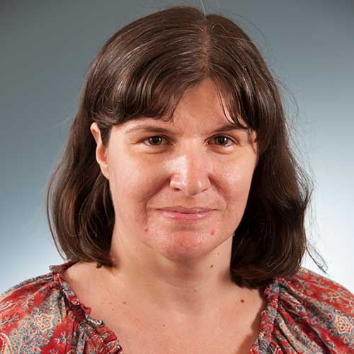 a woman looking at the camera