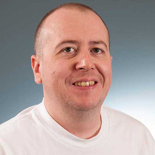 a man smiling for the camera