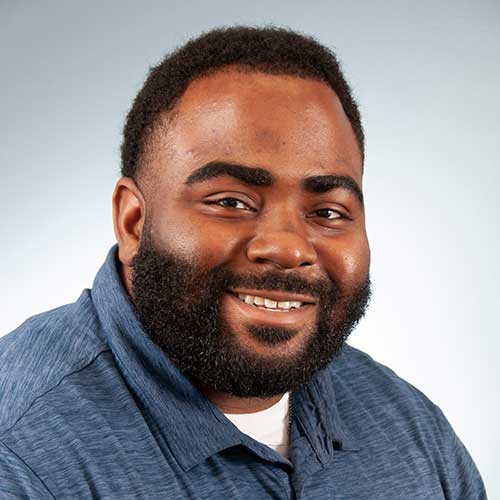 a man smiling for the camera