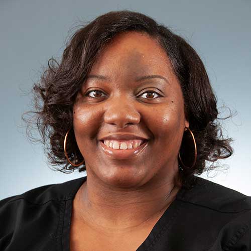 a person smiling for the camera