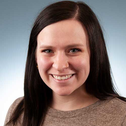 a woman smiling for the camera