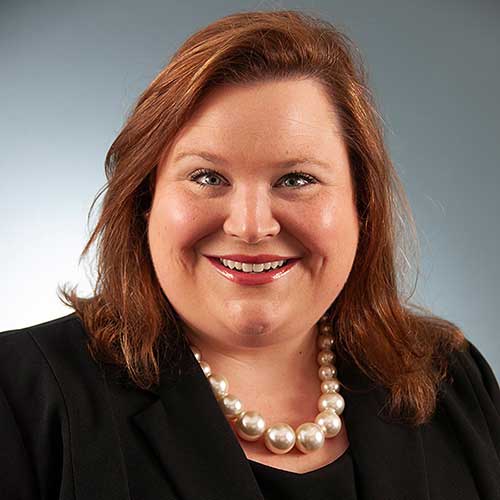 a woman smiling for the camera