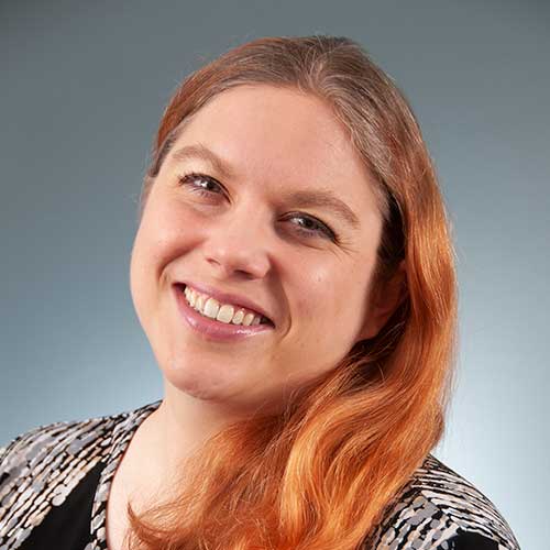 a woman smiling for the camera