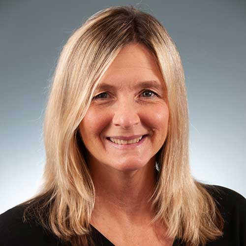 a woman smiling for the camera