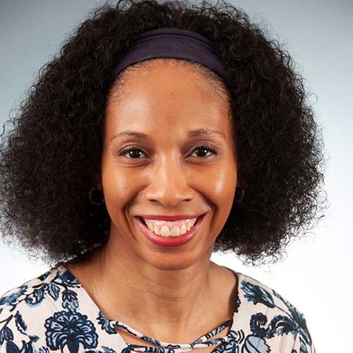 a woman smiling for the camera