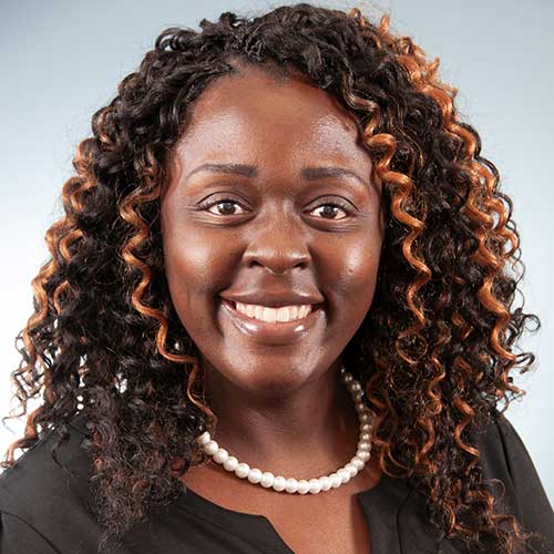 a woman smiling for the camera