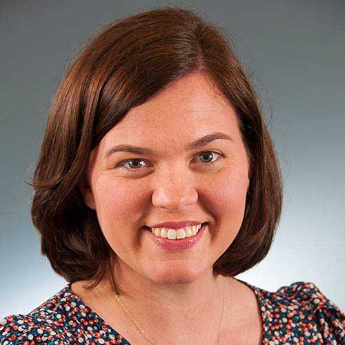 a woman smiling for the camera