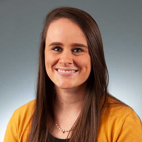 a woman smiling for the camera