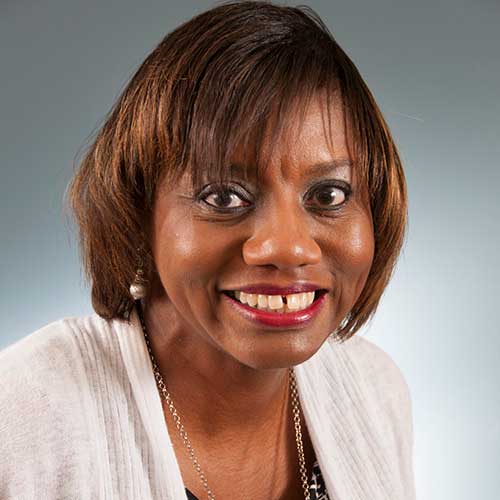 a woman smiling for the camera