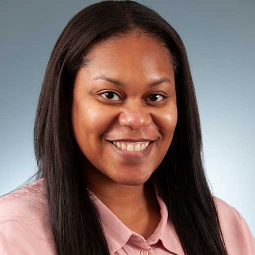 a woman smiling for the camera