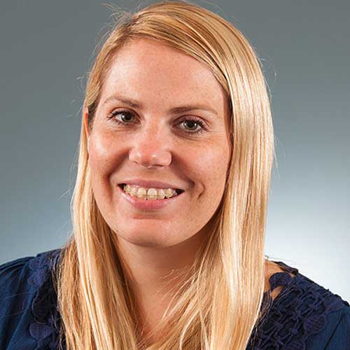 a woman smiling for the camera