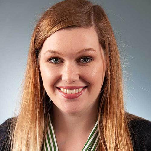 a woman smiling for the camera