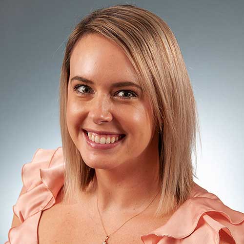 a woman smiling for the camera