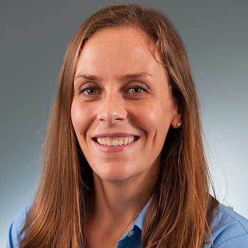 a woman smiling for the camera