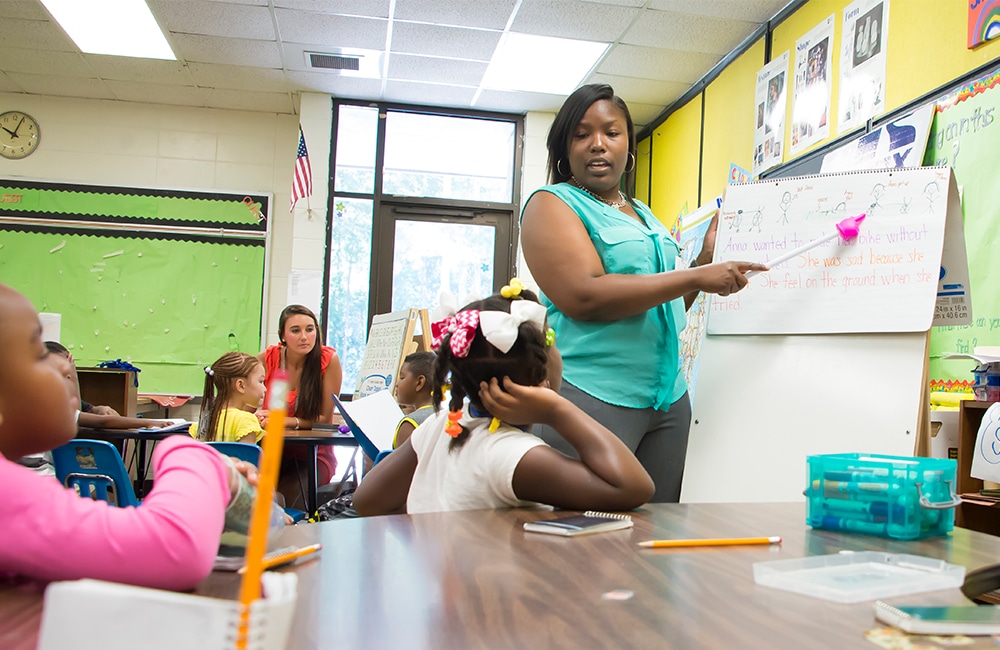 a group of people sitting at a table