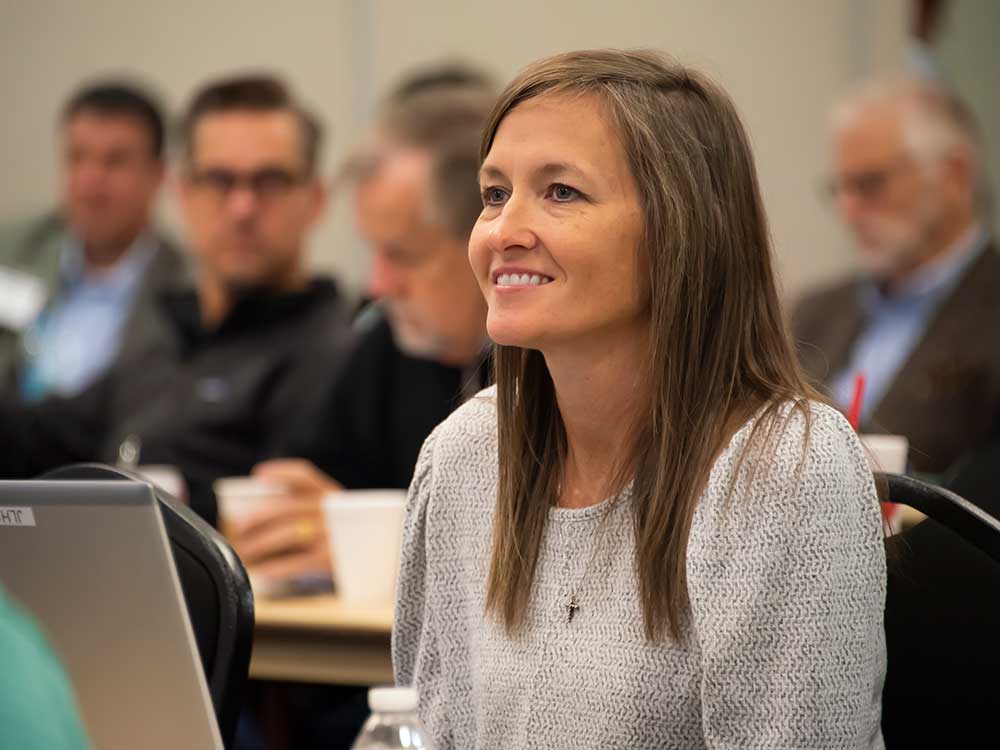 a woman looking at the camera