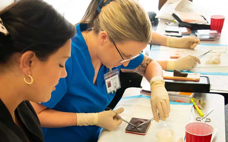 a woman sitting at a table