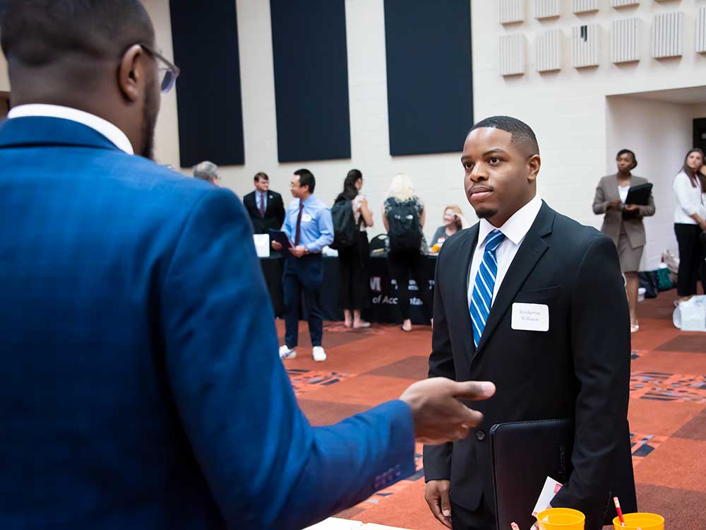 a man wearing a suit and tie
