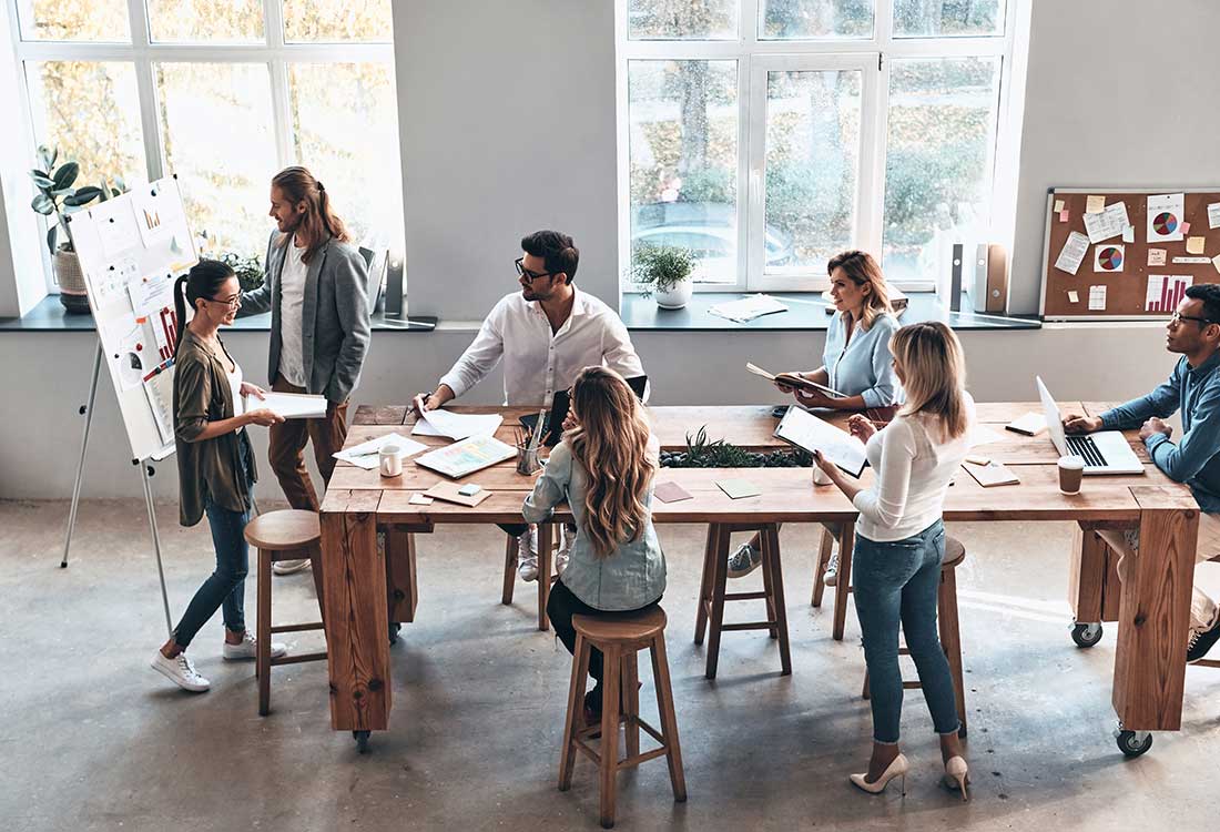a group of people sitting at a table