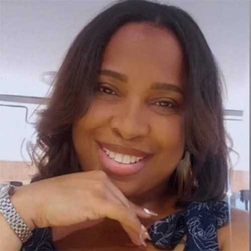 a woman smiling for the camera