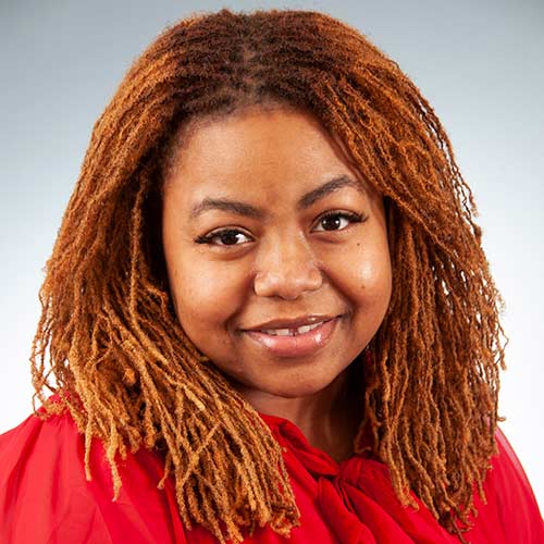 a woman smiling for the camera