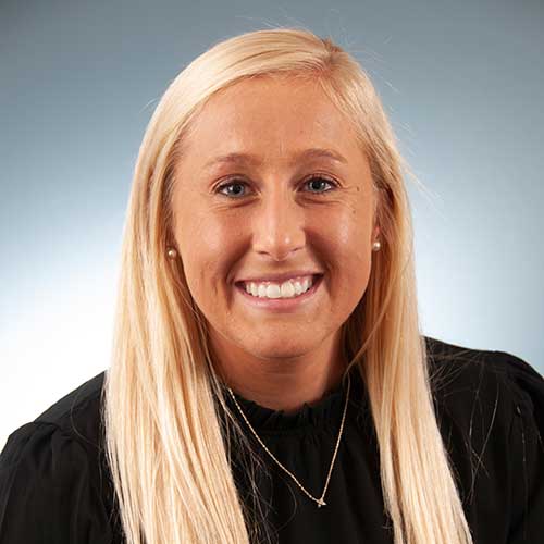 a woman smiling for the camera