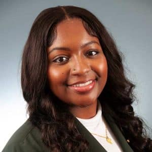 A Woman Smiling For The Camera