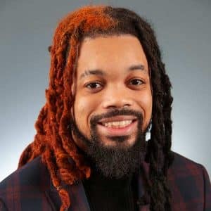 A Person Smiling For The Camera