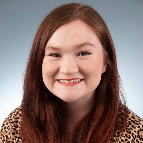 a woman smiling for the camera