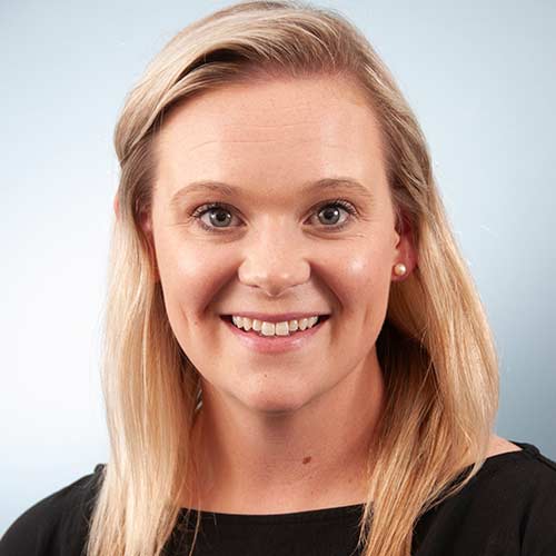 a woman smiling for the camera