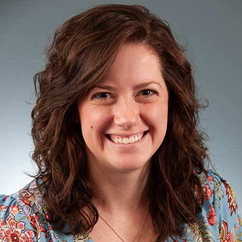 a woman smiling for the camera