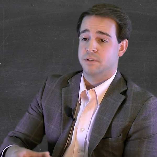 a man wearing a suit and tie