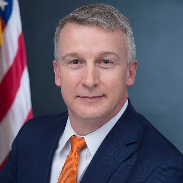 a man wearing a suit and tie