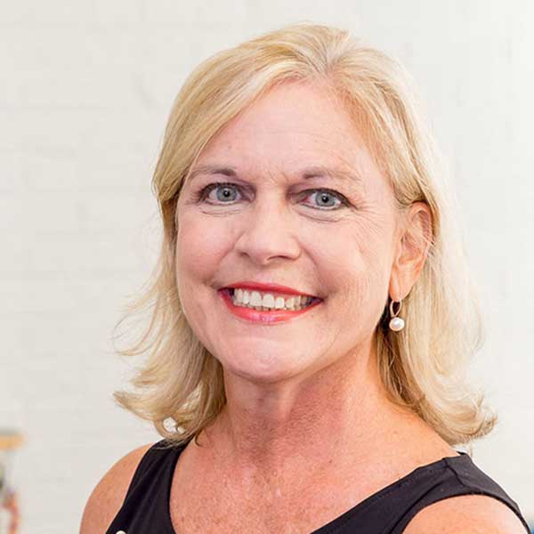 a woman smiling for the camera