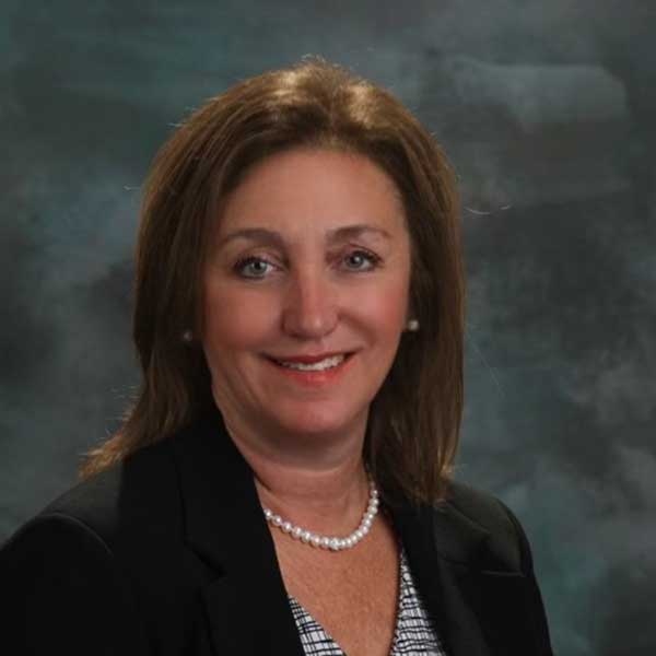 a woman smiling for the camera