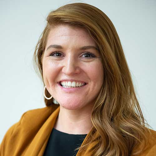 a woman smiling for the camera