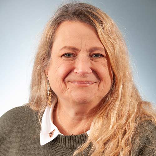 a woman smiling for the camera