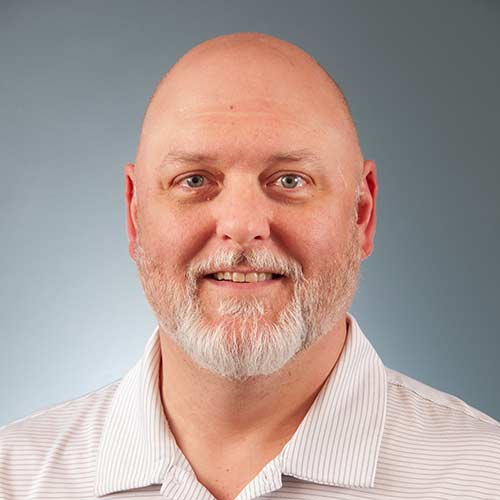 a man wearing a blue shirt