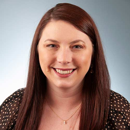 a woman smiling for the camera