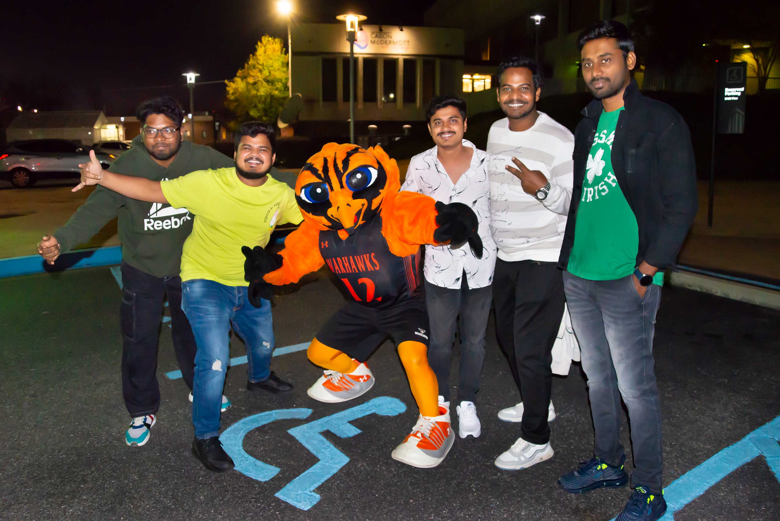 a group of people posing for the camera