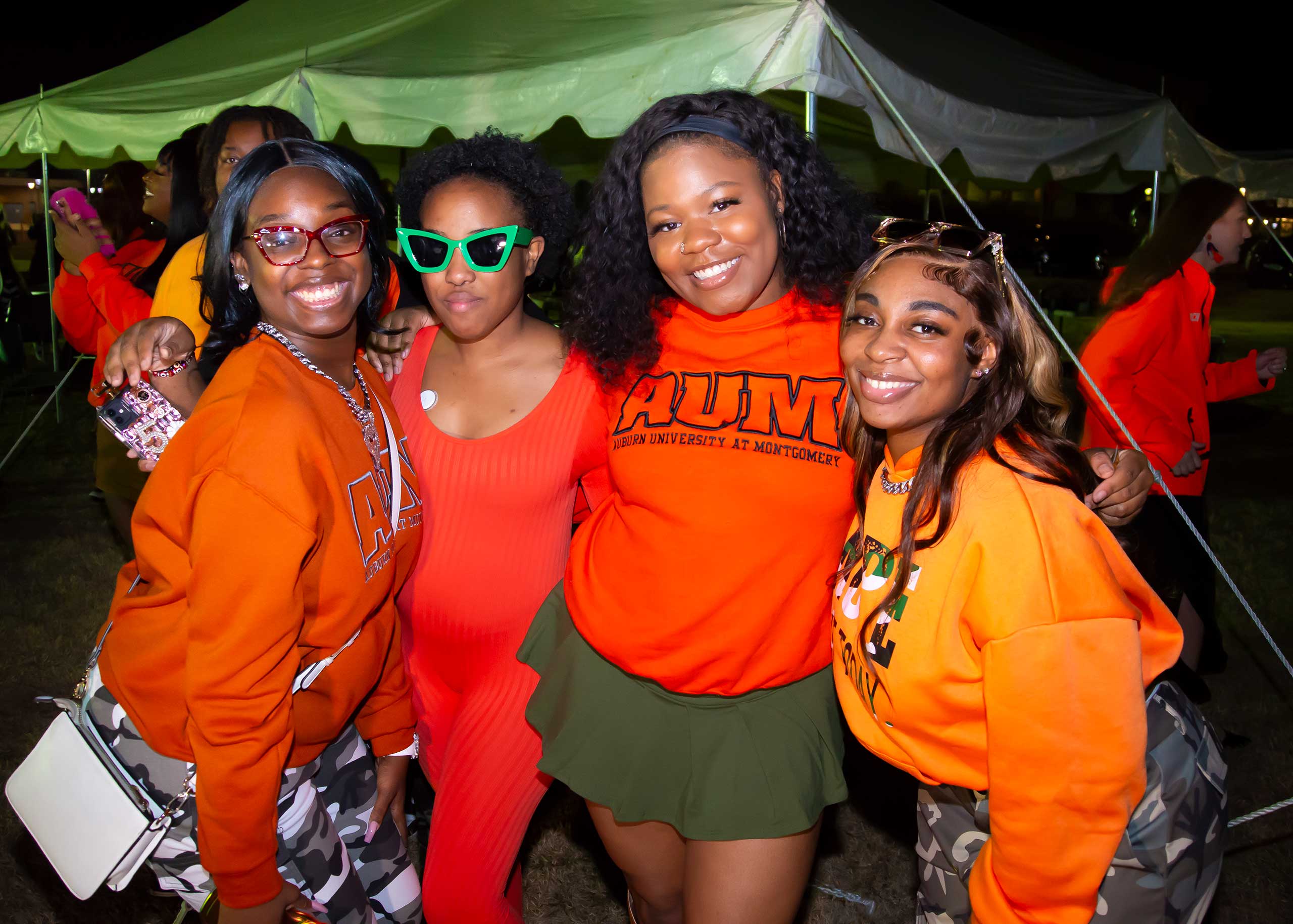 a group of people posing for the camera