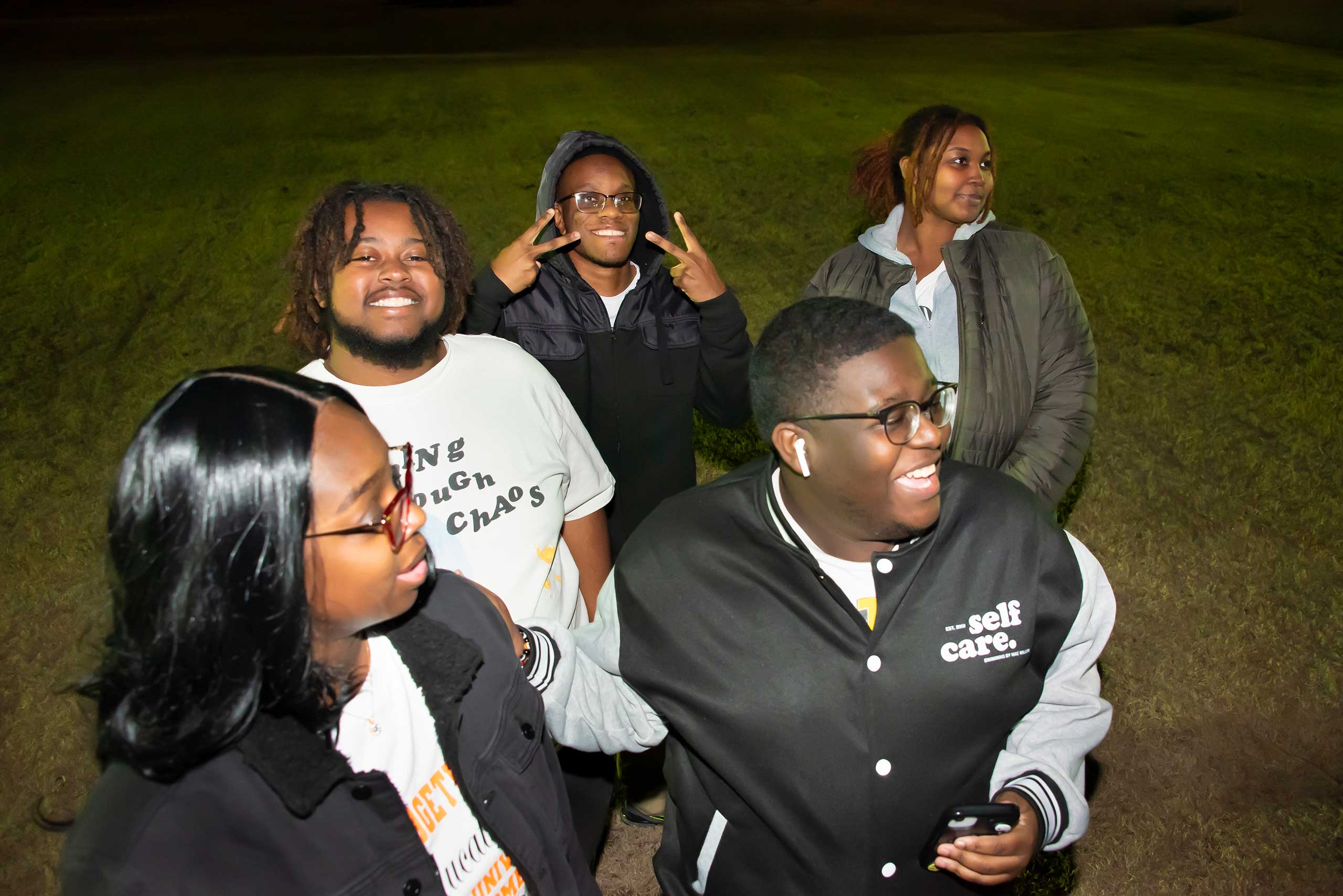 a group of people posing for the camera
