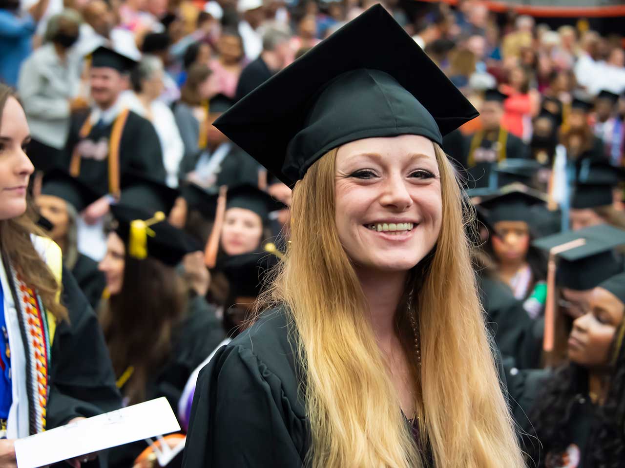 a person standing in front of a crowd