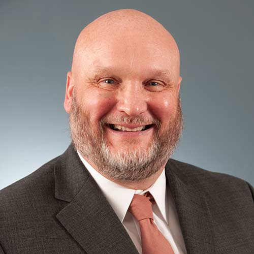 a man wearing a suit and tie