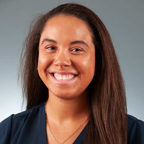a woman smiling for the camera